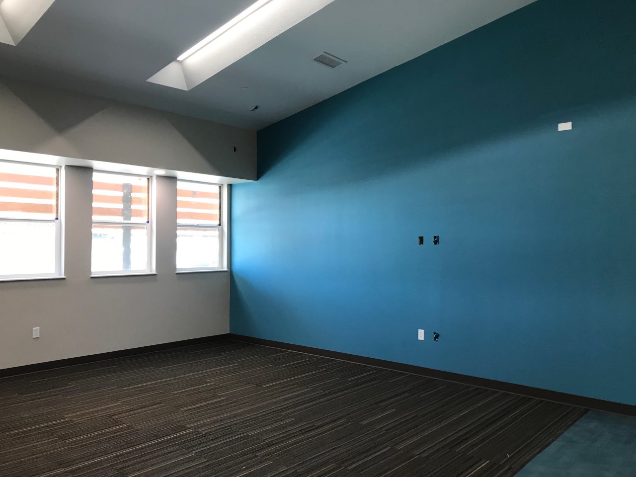 Photo of a room showing the bold blue paint used in the St. Rest Baptist Church Classroom Building.